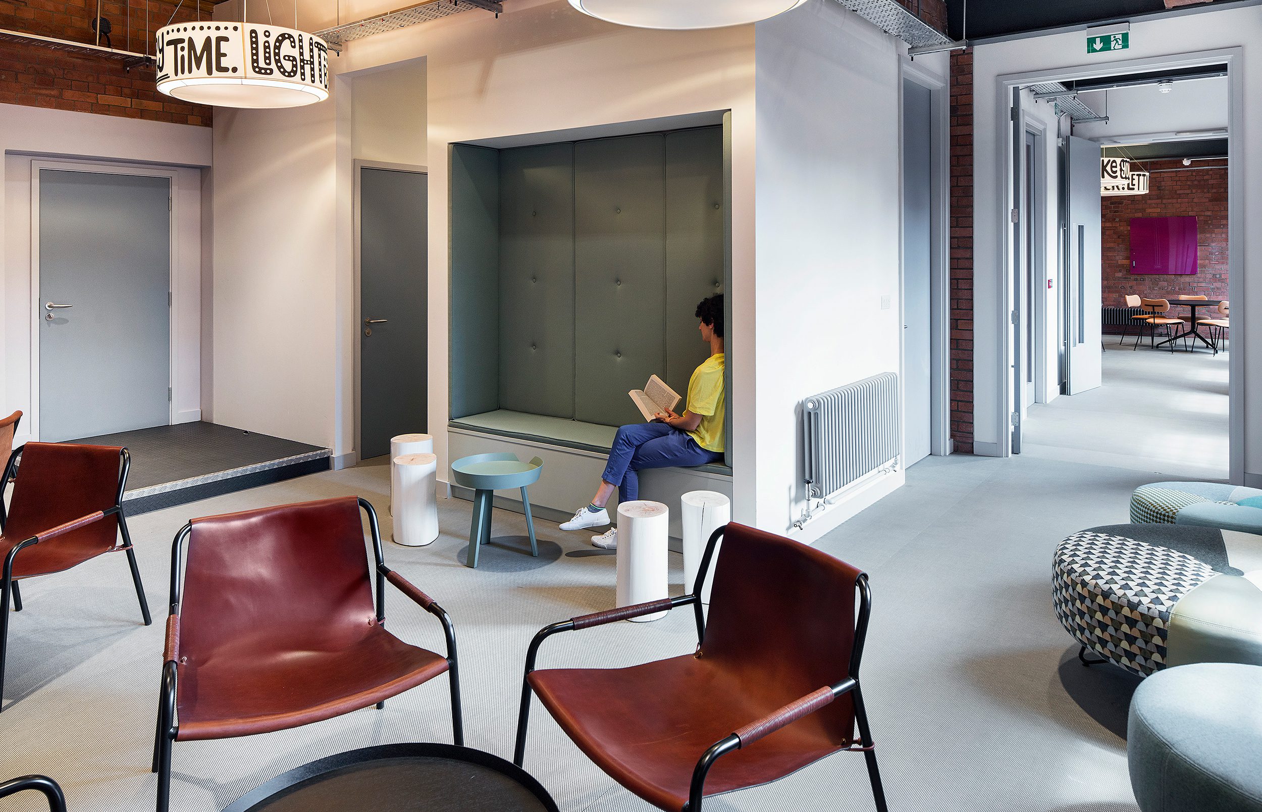 The second breakout space if a dynamic space with a variety of seating and tables