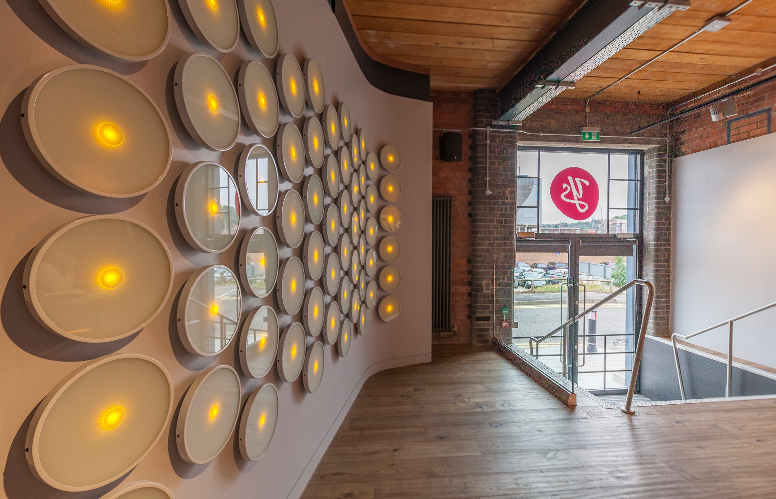 Our bright reception area with an interactive light wall.