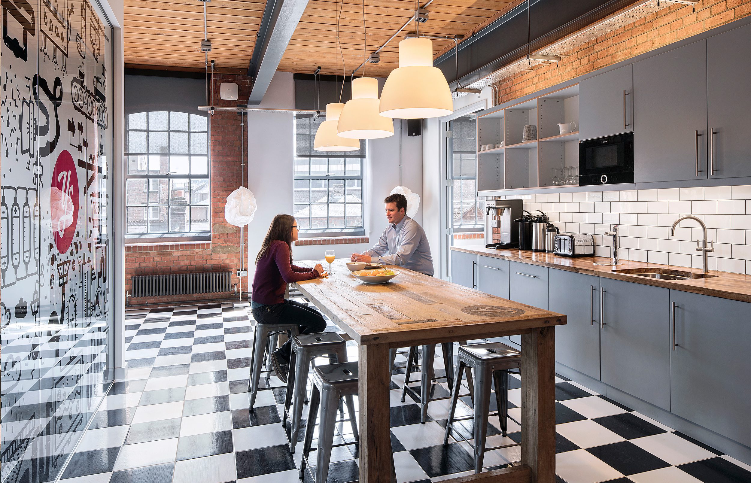 The Den also has access to a shared kitchen with a dining table, fridge and microwave.