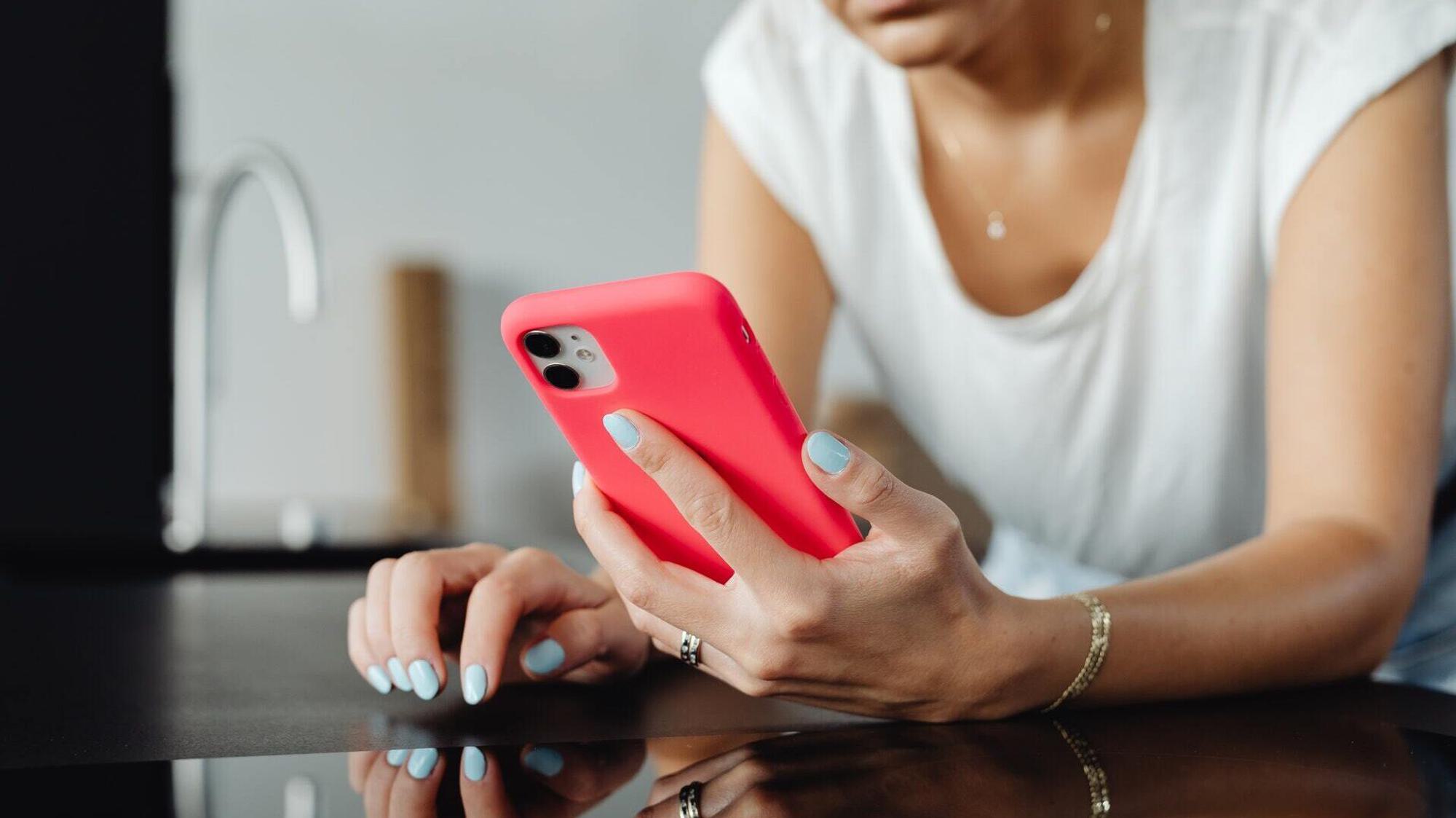 woman looking at phone