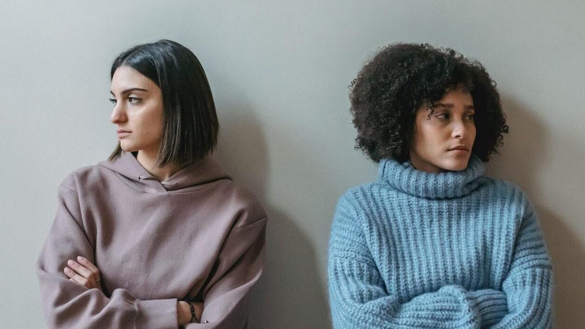 Two women not talking to each other