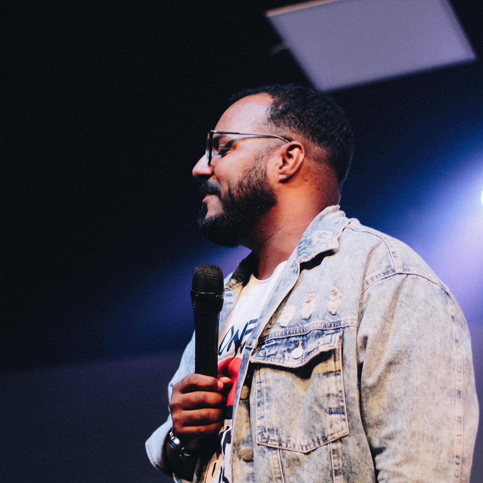 man speaking on stage