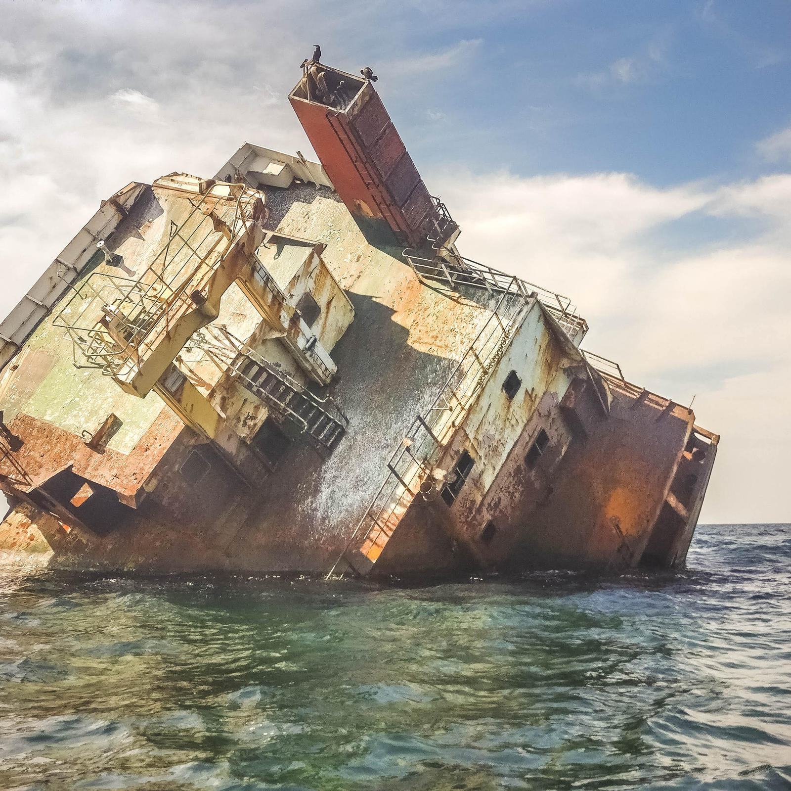 a ship sinking at sea
