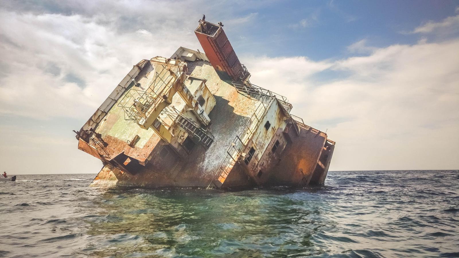 a ship sinking at sea